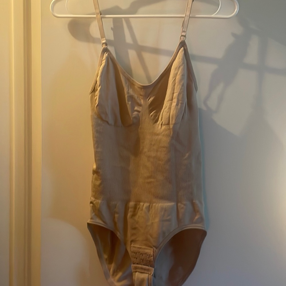 2 body suits- black and tan size large